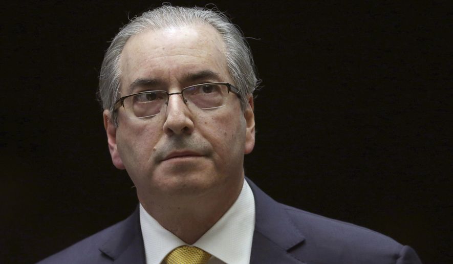 FILE - In this Sept. 12, 2016 file photo, Brazil's former President of the Chamber of Deputies Eduardo Cunha takes a break during the presentation of his defense at the Chamber of Deputies in Brasilia, Brazil. Cunha, who's in custody awaiting trial in a corruption case, has told a court that he has a brain aneurism. But on Wednesday, Feb. 8, 2017, prison official Luiz Alberto Cartaxo de Moura says Cunha refused tests. (AP Photo/Eraldo Peres, File)