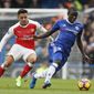 Chelsea&#x27;s N&#x27;Golo Kante, right holds off the challenge of Arsenal&#x27;s Alexis Sanchez during the English Premier League soccer match between Chelsea and Arsenal at Stamford Bridge stadium in London, Saturday, Feb. 4, 2017. (AP Photo/Kirsty Wigglesworth)