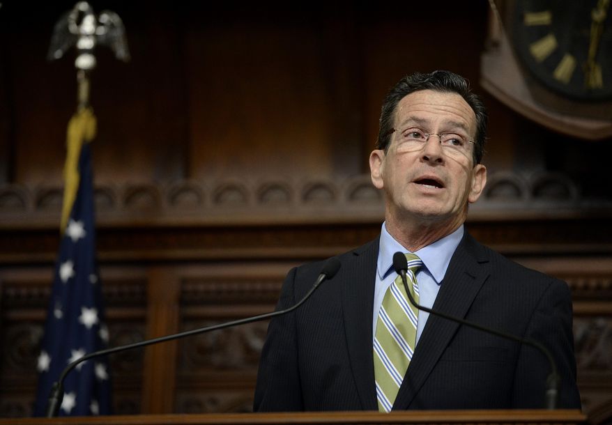 Connecticut Gov. Dannel P. Malloy delivers his budget address to members of the house and senate inside the Hall of the House at the state Capitol in Hartford, Conn., Wednesday, Feb. 8, 2017. (AP Photo/Jessica Hill)