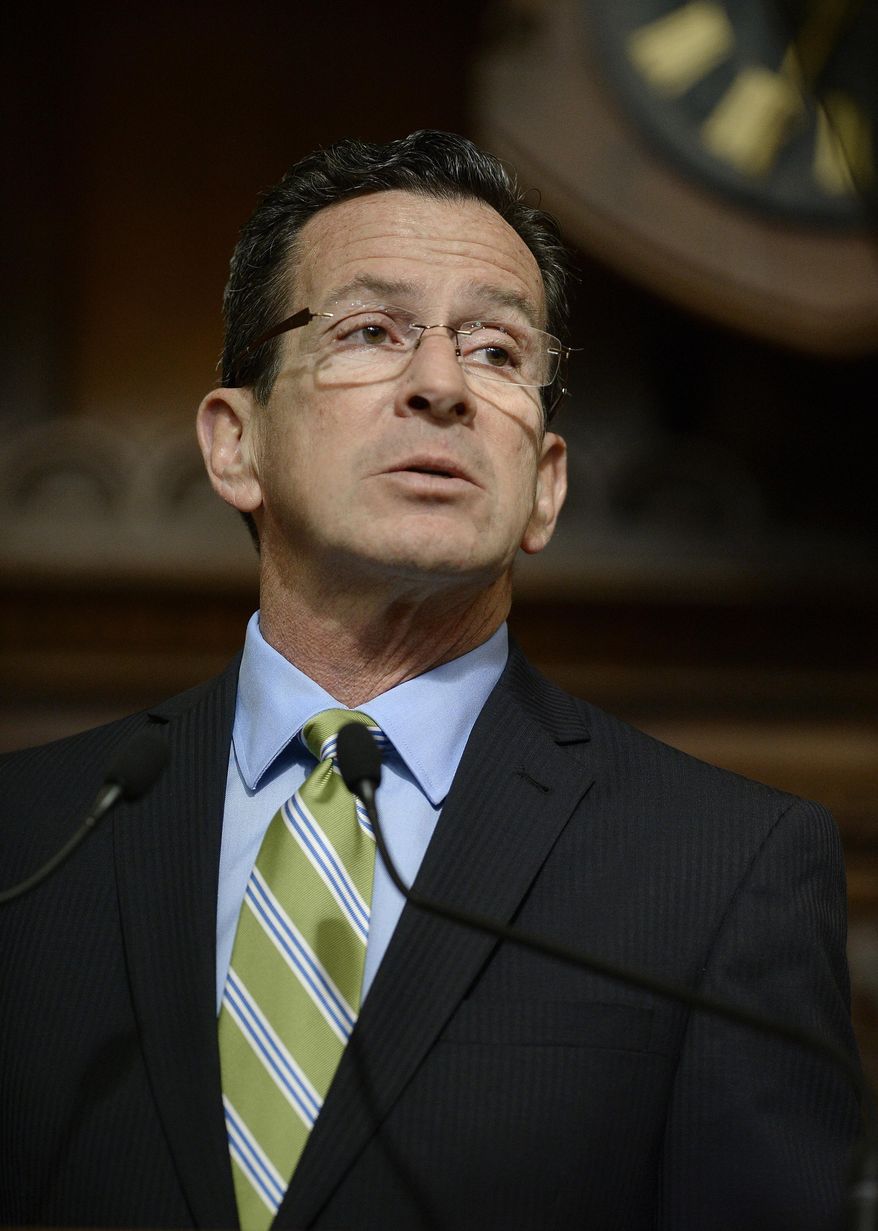 Connecticut Gov. Dannel P. Malloy delivers his budget address to members of the house and senate inside the Hall of the House at the state Capitol in Hartford, Conn., Wednesday, Feb. 8, 2017. (AP Photo/Jessica Hill)