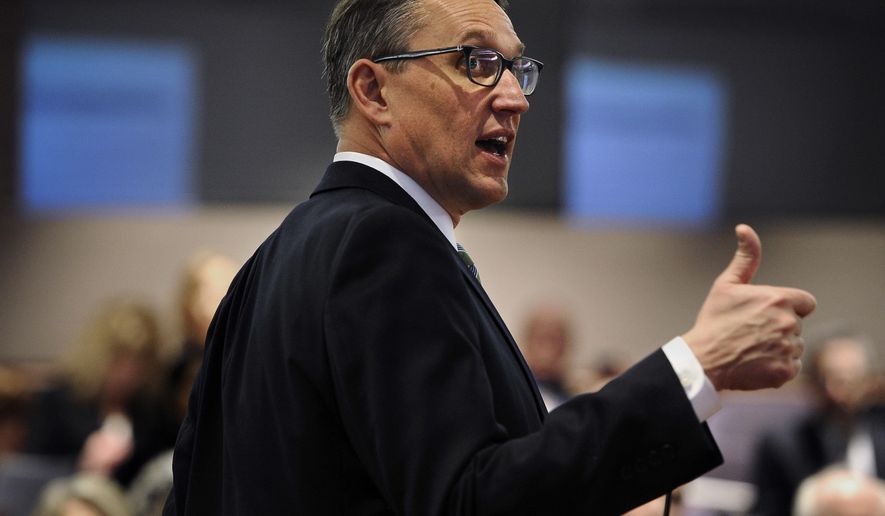 Office of Policy and Management Secretary Ben Barnes holds a presentation on Connecticut Gov. Dannel P. Malloy's budget proposal for members of the media at the Legislative Office Building in Hartford, Conn., Wednesday, Feb. 8, 2017. (AP Photo/Jessica Hill)