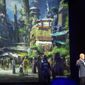 FILE - In this Saturday, Aug. 15, 2015, file photo, Bob Chapek, chairman of Walt Disney Parks and Resorts, speaks in front of concept art of the newly announced Star Wars Land at the D23 Expo in Anaheim, Calif. Disney CEO Bob Iger said Tuesday, Feb. 7, 2017, the company will open its Star Wars-themed lands at California’s Disneyland and Florida’s Walt Disney World in 2019. (Mindy Schauer/The Orange County Register via AP, File)