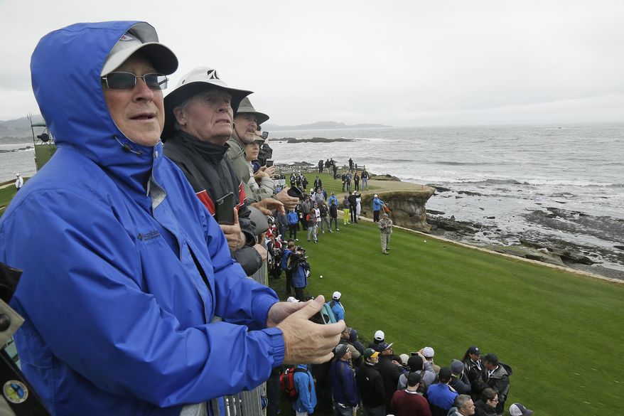 Spectators watch Daniel Lawrence Whitney, better known as, Larry the Cable Guy, hit from the 18th tee during the celebrity challenge event of the AT&amp;amp;T Pebble Beach National Pro-Am golf tournament Wednesday, Feb. 8, 2017, in Pebble Beach, Calif. (AP Photo/Eric Risberg)