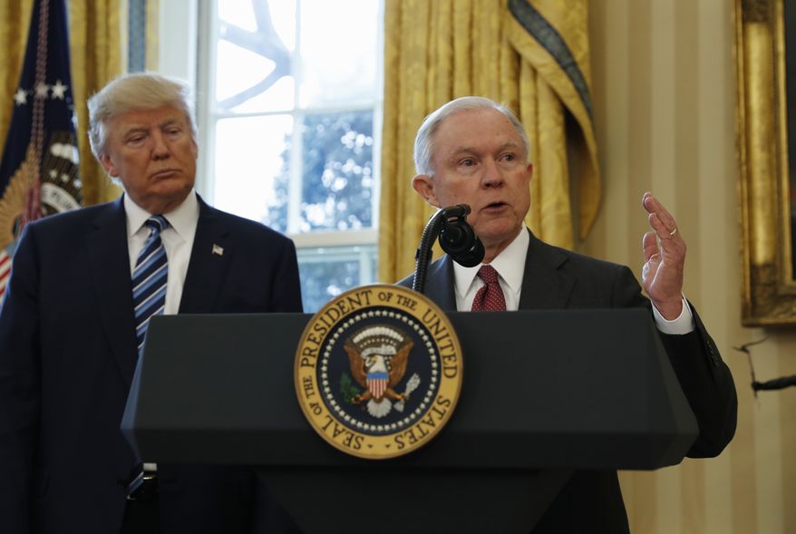 President Donald Trump listens as Attorney General Jeff Sessions speaks in the Oval Office of the White House in Washington, after Vice President Mike Pence administered the oath of office to Sessions. (AP Photo/Pablo Martinez Monsivais)