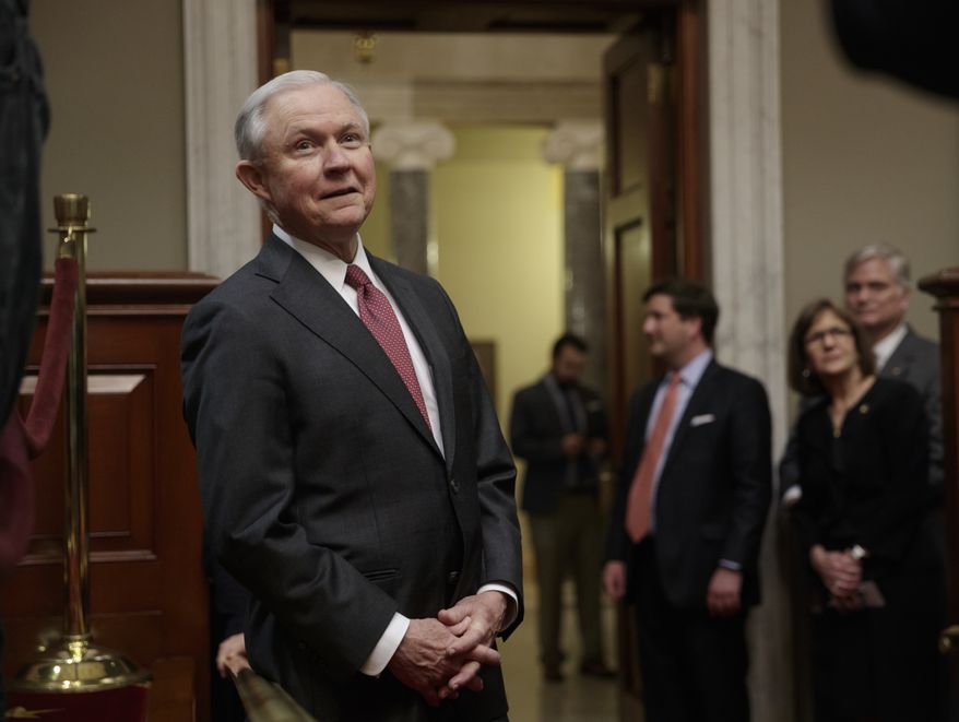 New Attorney General Jeff Sessions watches from the background as his Senate replacement Sen. Luther Strange, R-Ala. is welcomed at a ceremony on Capitol Hill in Washington, Thursday, Feb. 9, 2017. (AP Photo/J. Scott Applewhite)