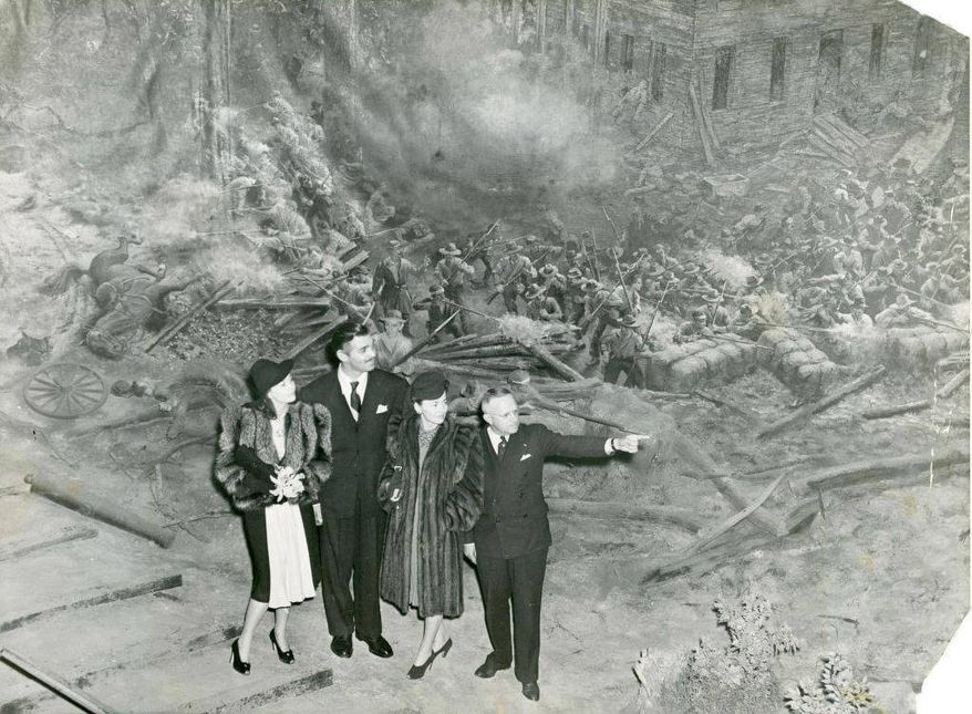 In this Dec 16, 1939 photo, Vivien Leigh, Clark Gable, Olivia DeHaviland and George Simons visit Cyclorama, a colossal panoramic painting depicting the Battle of Atlanta from the American Civil War, during the Gone with the Wind premiere, in Atlanta. The painting will soon be moved from the building where it has been displayed for nearly a century. Historians said moving the 6-ton Cyclorama from Grant Park to the Atlanta History Center across town marks a major milestone in its restoration. The move is to begin Thursday, Feb. 9, 2017. (Atlanta Journal-Constitution via AP)