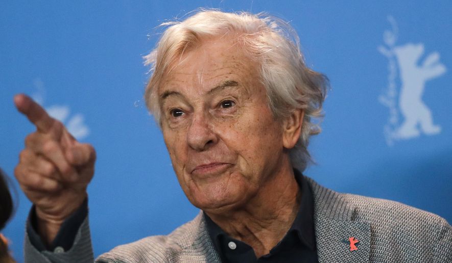 Paul Verhoeven, president of the Jury of the 67th International Berlin Film Festival, gestures as he poses for media during a photo call at the 2017 Berlinale Film Festival in Berlin, Germany, Thursday, Feb. 9, 2017. (AP Photo/Markus Schreiber)