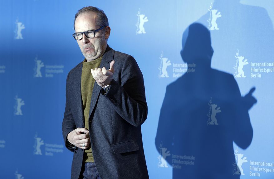 Director Etienne Comar poses for the photographers during a photo call for the film 'Django' at the 2017 Berlinale Film Festival in Berlin, Germany, Thursday, Feb. 9, 2017. (AP Photo/Michael Sohn)