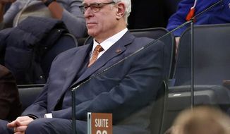 FILE- In this Jan. 9, 2017 file photo, New York Knicks president Phil Jackson watches from the stands during the second half of an NBA basketball game against the New Orleans Pelicans at Madison Square Garden in New York. Jackson may be trying to trade Carmelo Anthony because he&#39;s given up trying to change him. That seemed to be the conclusion when he broke his Twitter silence with a tweet that was another dig at the star forward. (AP Photo/Kathy Willens, File)