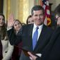 FILE - In this Friday, Jan. 6, 2017, file photo, Roy Cooper is ceremonially sworn in as Governor of North Carolina by Chief Justice Mark Martin during a ceremony at the Executive Mansion in Raleigh, N.C. Cooper&#x27;s daughters from left, Hilary, Natalie and Claire look on. A North Carolina court has temporarily blocked a state law passed by the GOP-controlled legislature that strips the Democratic governor of his some of his powers. A three-judge panel released the order Wednesday, Feb. 8, 2017, just before state senators scheduled a hearing with the secretary of Cooper&#x27;s veterans&#x27; affairs department to come before a committee to answer questions. (Robert Willett/The News &amp;amp; Observer via AP, File)