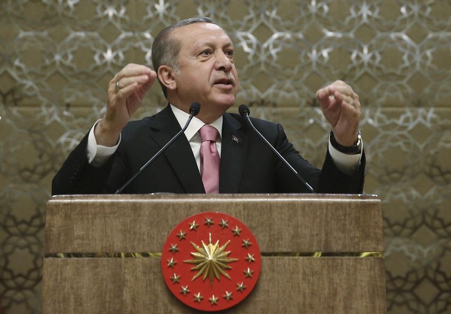 Turkey&#x27;s President Recep Tayyip Erdogan addresses local administrators after the government has sacked nearly 4,500 more state employees, including academicians, as it appeared to press ahead with a purge of people with suspected links to a U.S.-based cleric accused of orchestrating a failed military coup, in Ankara, Turkey, Wednesday, Feb. 8, 2017. .(YasinBulbul/Pool photo via AP)