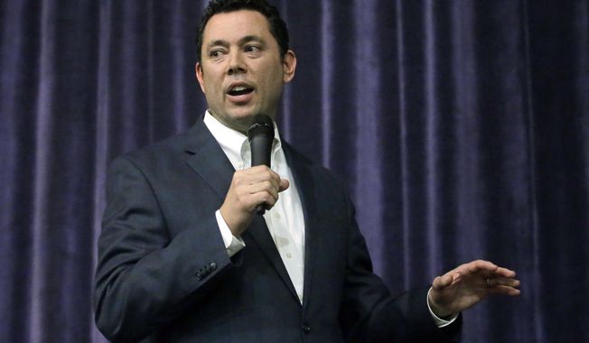 Rep. Jason Chaffetz speaks during a town hall meeting at Brighton High School, Thursday, Feb. 9, 2017, in Cottonwood Heights, Utah. Hundreds of people lined up early for a town hall with Chaffetz on Thursday evening, many holding signs criticizing the congressman's push to repeal the newly-named Bears Ears National Monument in southern Utah. (AP Photo/Rick Bowmer)