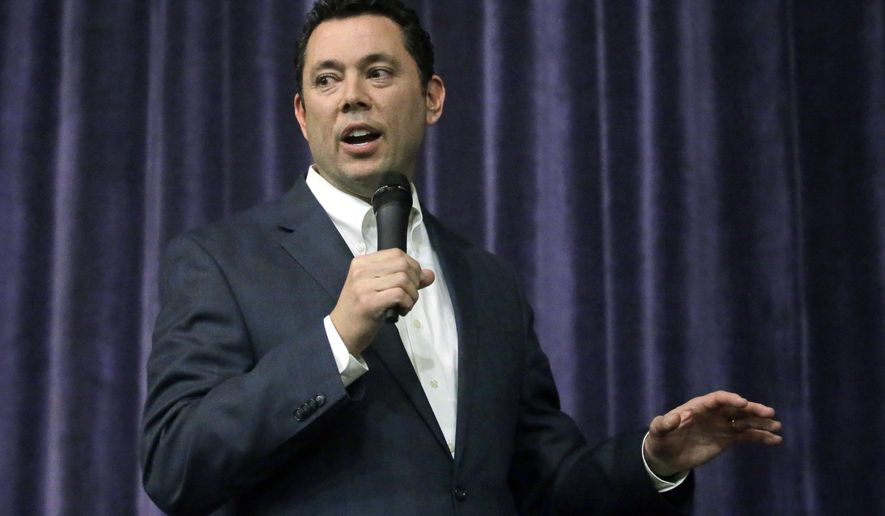 Rep. Jason Chaffetz speaks during a town hall meeting at Brighton High School, Thursday, Feb. 9, 2017, in Cottonwood Heights, Utah. Hundreds of people lined up early for a town hall with Chaffetz on Thursday evening, many holding signs criticizing the congressman's push to repeal the newly-named Bears Ears National Monument in southern Utah. (AP Photo/Rick Bowmer)
