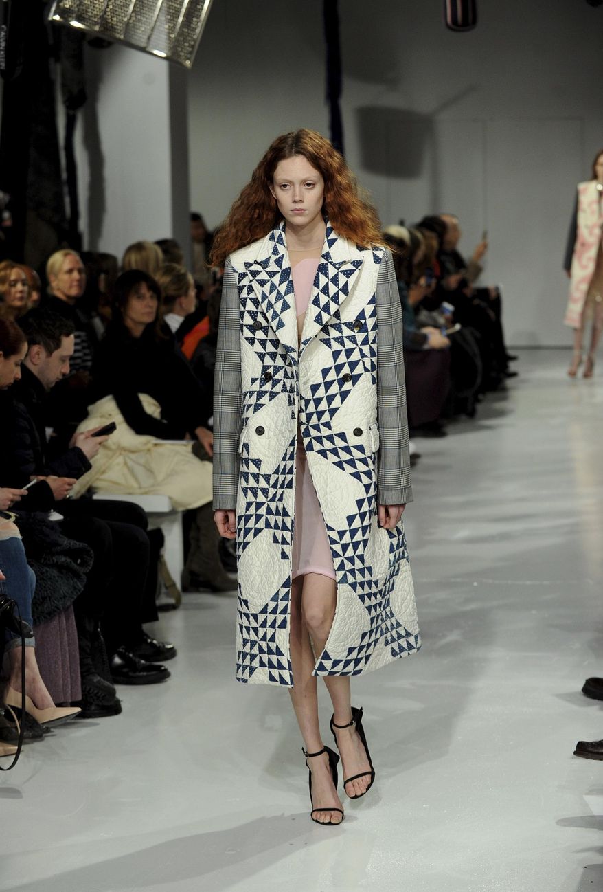 The Calvin Klein fashion collection is modeled during Fashion Week in New York, Friday, Feb. 10, 2017. (AP Photo/Diane Bondareff)