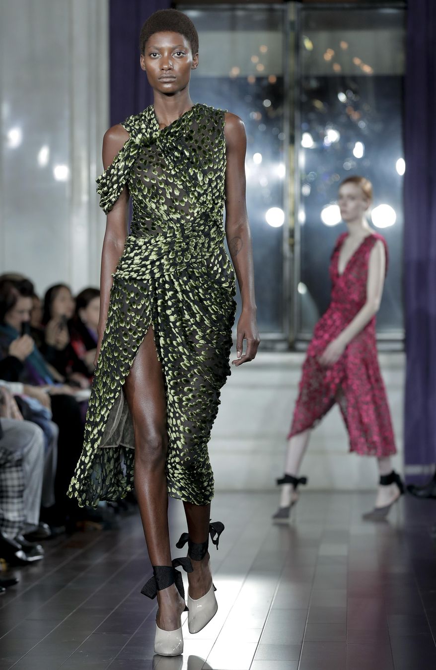 The Jason Wu fashion collection is modeled during Fashion Week, Friday, Feb. 10, 2017, in New York. (AP Photo/Julie Jacobson)
