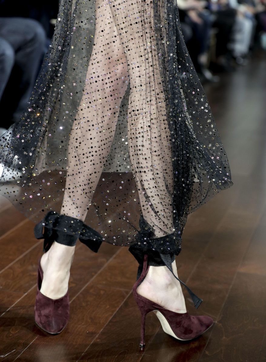 The Jason Wu fashion collection is modeled during Fashion Week, Friday, Feb. 10, 2017, in New York. (AP Photo/Julie Jacobson)