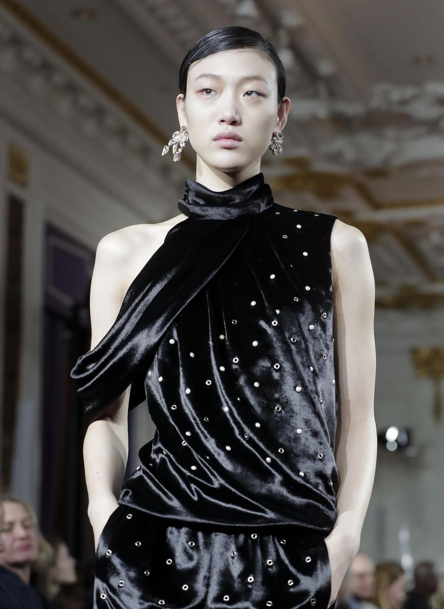 The Jason Wu fashion collection is modeled during Fashion Week, Friday, Feb. 10, 2017, in New York. (AP Photo/Julie Jacobson)