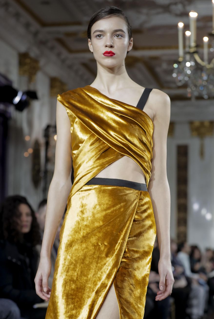 The Jason Wu fashion collection is modeled during Fashion Week, Friday, Feb. 10, 2017, in New York. (AP Photo/Julie Jacobson)