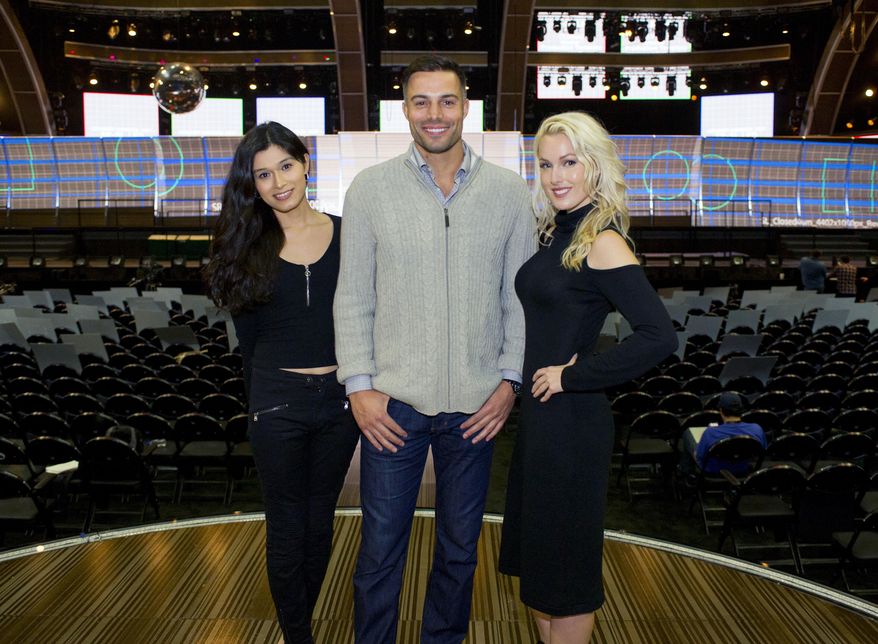 This Feb. 9, 2017 photo shows trophy presenters, from left, transgender model Martina Robledo, actor and model Derek Marrocco, and model and actress Hollin Haley in Los Angeles. The trio will present awards during the 59th Annual Grammy Awards airing live, Sunday, Feb. 12, on CBS. ( Johnny Vy/CBS via AP)