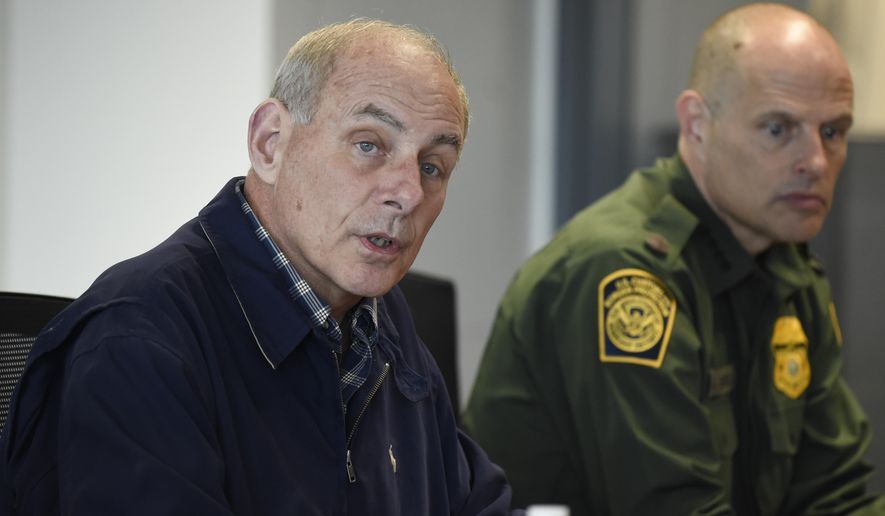 Secretary of Homeland Security John Kelly (left) speaks as Chief of United States Border Patrol Ronald Vitiello, right, looks on during a meeting held at the San Ysidro Port of Entry in San Diego on Feb. 10, 2017. (AP Photo/Denis Poroy, Pool) **FILE**