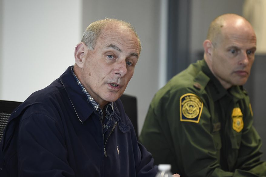 Secretary of Homeland Security John Kelly (left) speaks as Chief of United States Border Patrol Ronald Vitiello, right, looks on during a meeting held at the San Ysidro Port of Entry in San Diego on Feb. 10, 2017. (AP Photo/Denis Poroy, Pool) **FILE**