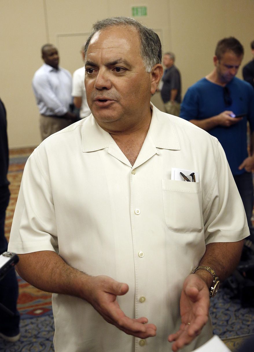 FILE - In this Nov. 9, 2016, file photo, Detroit Tigers general manager Al Avila talks to reporters during baseball's annual general managers meeting in Scottsdale, Ariz. The Tigers were willing to cut payroll, but they did not want to face the dire consequences of gutting their roster. That is Avila’s explanation for why his team’s offseason became such a quiet one. (AP Photo/Ross D. Franklin, File)