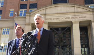 Virginia Attorney General Mark Herring, right, accompanied by Virginia Solicitor General Stuart Raphael, speaks outside the federal courthouse in Alexandria, Va., Friday, Feb. 10, 2017, following a hearing on President Donald Trump&#39;s travel ban. (AP Photo/Jessica Gresko) ** FILE **