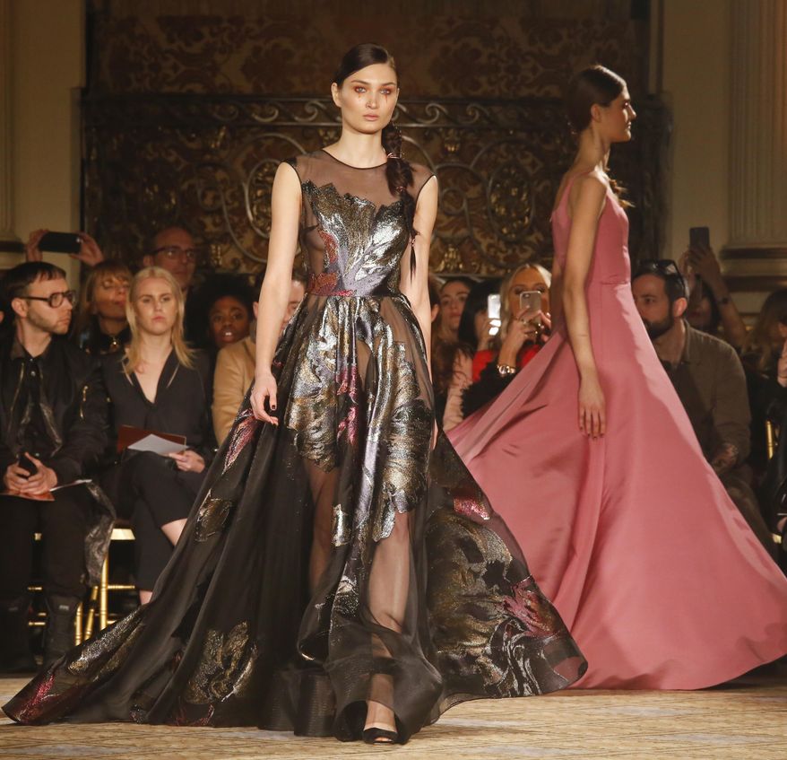 The fashion collection from Christian Siriano is modeled during Fashion Week, Saturday Feb. 11, 2017, in New York. (AP Photo/Bebeto Matthews)