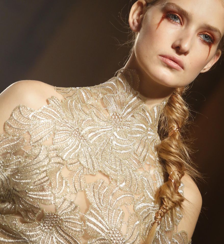 The fashion collection from Christian Siriano is modeled during Fashion Week, Saturday Feb. 11, 2017, in New York. (AP Photo/Bebeto Matthews)