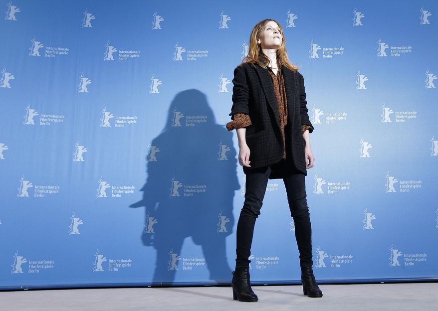 Actress Clemence Poesy poses for the photographers during a photo call for the film 'Final Portrait' at the 2017 Berlinale Film Festival in Berlin, Germany, Saturday, Feb. 11, 2017. (AP Photo/Michael Sohn)