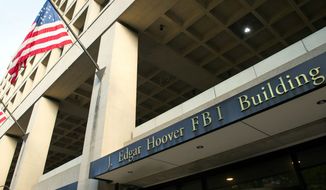 The FBI&#39;s J. Edgar Hoover Headquarters in Washington was built in 1974, and cannot handle all 11,000 employees. A new facility is planned. (Associated Press)