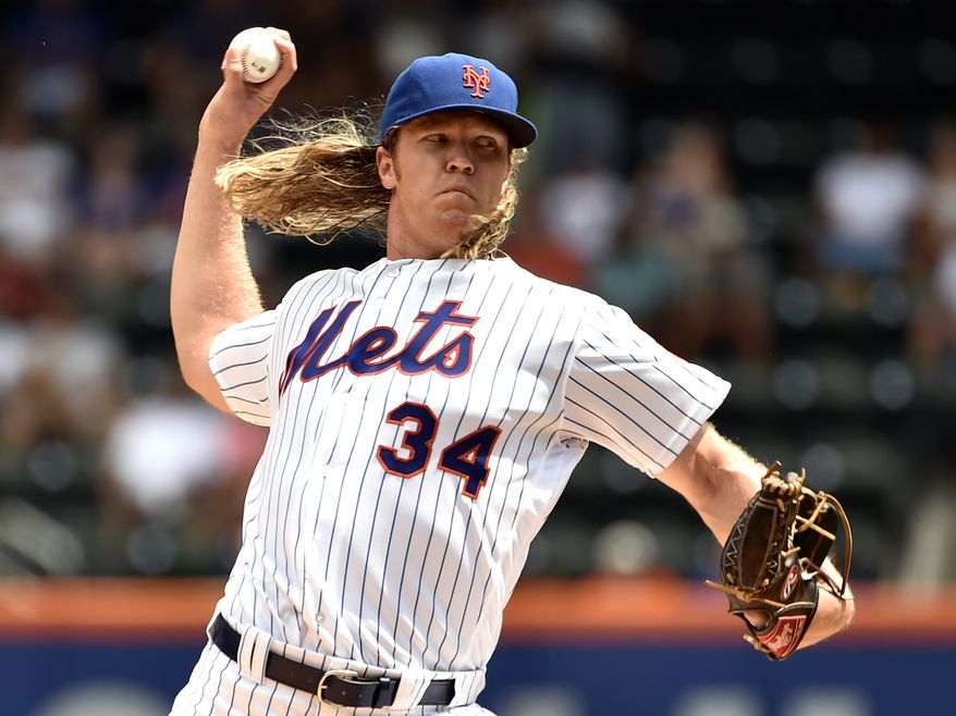 FILE - In this Aug. 11, 2016, file photo, New York Mets pitcher Noah Syndergaard works against the Arizona Diamondbacks in the first inning of a baseball game in New York. In a clubhouse that featured a rotation that ranked among the most oft-injured last year, Syndergaard stood out and was the Last Pitcher Standing as the long season unfolded. (AP Photo/Kathy Kmonicek, File)
