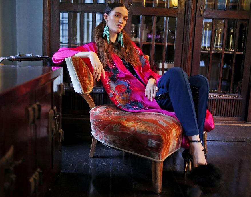 A model wears clothes from the Tracy Reese collection at a presentation during Fashion Week in New York, Sunday, Feb. 12, 2017. (AP Photo/Seth Wenig)