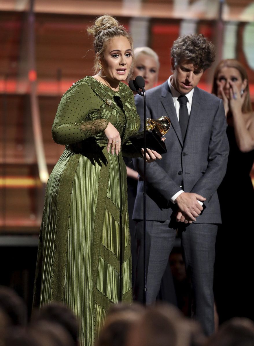 Adele accepts the award for song of the year for "Hello" at the 59th annual Grammy Awards on Sunday, Feb. 12, 2017, in Los Angeles. (Photo by Matt Sayles/Invision/AP)