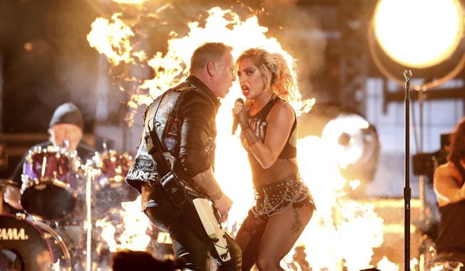 Lady Gaga, right, and James Hetfield of &amp;quot;Metallica&amp;quot; perform &amp;quot;Moth Into Flame&amp;quot; at the 59th annual Grammy Awards on Sunday, Feb. 12, 2017, in Los Angeles. (Photo by Matt Sayles/Invision/AP)