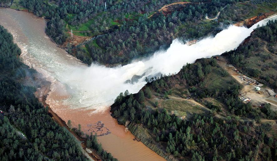 The California Department of Water Resources increased the amount of water being discharged from Lake Oroville in anticipation of storms later this week as well as snowmelt this spring, but criticism about neglect of the 50-year-old dam continues to flood the office of Gov. Jerry Brown. (Associated Press)