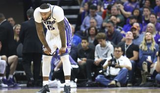 Sacramento Kings center DeMarcus Cousins pauses after being called for a technical foul during the first half of an NBA basketball game against the New Orleans Pelicans in Sacramento, Calif., Sunday, Feb. 12, 2017. (AP Photo/Steve Yeater)