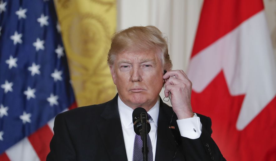 President Donald Trump listens during a joint news conference with Canadian Prime Minister Justin Trudeau in the East Room of the White House in Washington, Monday, Feb. 13, 2017. (AP Photo/Pablo Martinez Monsivais)