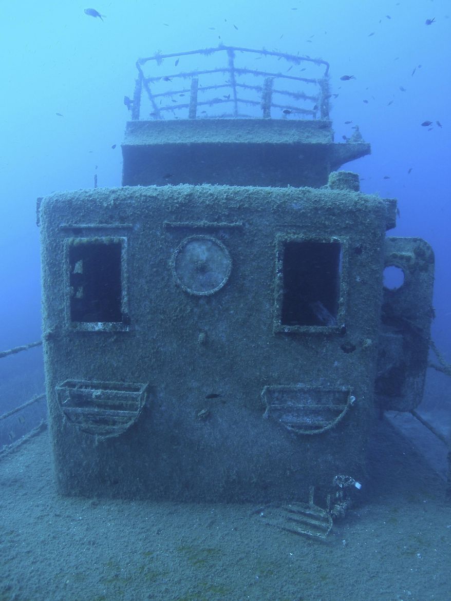 This undated picture provided on Monday, Feb. 13, 2017 by the Albanian National Coastline Agency shows a shipwreck discovered by the RPM's Hercules research vessel in Ionian Sea, Albania. The country is promoting the archaeological finds in the waters off its southwest coast to raise public interest and to attract attention of decision-makers who can help preserve the discoveries. The Albanian National Coastline Agency opened an exhibition on Monday, Feb. 13 of 30 pictures showing underwater finds of potential archaeological significance from the last decade. (The Albanian National Coastline Agency via AP)