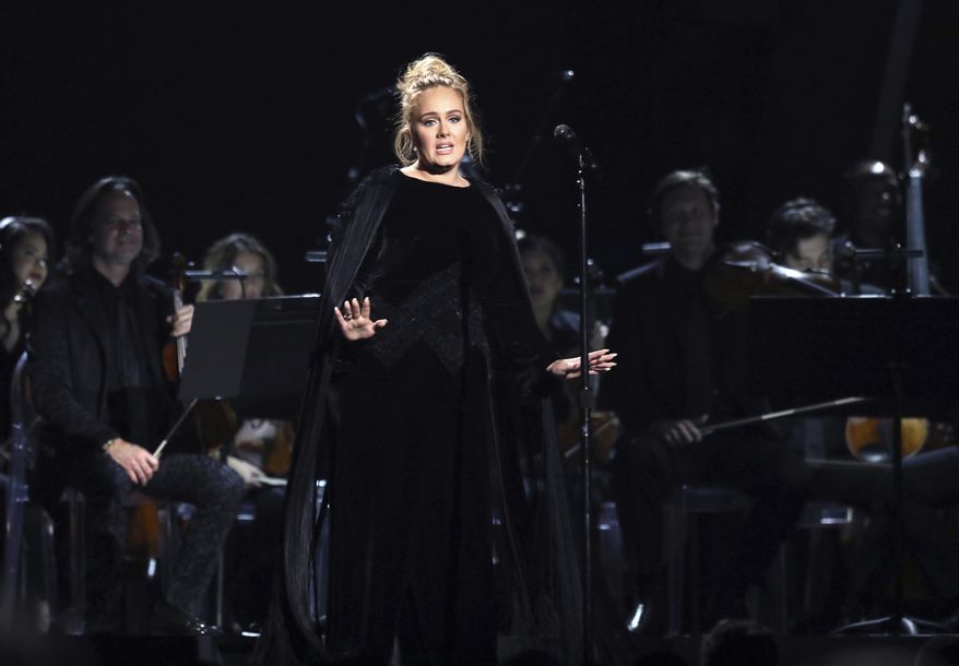 Adele performs a tribute to George Michael at the 59th annual Grammy Awards on Sunday, Feb. 12, 2017, in Los Angeles. (Photo by Matt Sayles/Invision/AP)