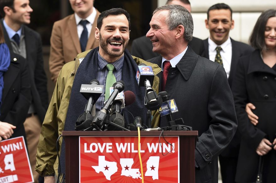 FILE - In this Jan. 9, 2015, file photo, Sergio March, left, along with his husband Havard Scott speak to the media outside of the 5th U.S. Circuit Court of Appeals in New Orleans. Opponents and supporters of gay marriage argued their sides before the 5th U.S. Circuit Court of Appeals, on gay marriage bans in Texas, Louisiana and Mississippi . New Orleans has long enjoyed a reputation in the South as a welcoming place for the lesbian and gay community. That reputation will be on display when the city hosts the NBA All-Star game next weekend. The game was awarded to New Orleans after the league decided to pull it from Charlotte last year. (AP Photo/Stacy Revere, File)