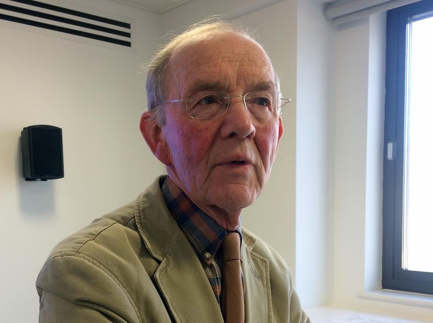 Consultant psychiatrist Dr. Don Williams speaks to the Associated Press in his office in London, Tuesday, Feb. 14, 2017. The degenerative damage potentially caused by repeated blows to the head in soccer has been highlighted by a rare study of brains of a small number of retired players who developed dementia. Williams played a key role in the research after starting to monitor former footballers who were diagnosed with dementia from 1980. (AP Photo/Rob Harris)
