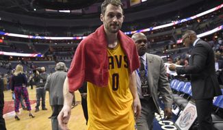 FILE - In this Feb. 6, 2017, file photo, Cleveland Cavaliers forward Kevin Love (0) leaves the court after an NBA basketball game against the Washington Wizards, in Washington. Love will be out at least six weeks following left knee surgery. Love had the operation on his left knee on Tuesday, Feb. 14, 2017, in New York. (AP Photo/Nick Wass, File)