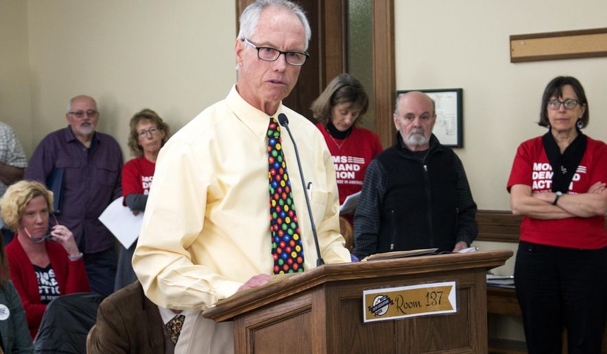 John Moffatt testifies before the House Judiciary Committee of the Montana Legislature on Tuesday, Feb. 14, 2017, in Helena, Mont. Moffatt opposes a bill that would allow school employees with concealed weapons permits to carry their firearms on school campuses. Moffatt was shot in 1986 when a student opened fire at Fergus High School in Lewistown, where Moffatt was the vice principal. A substitute teacher was killed. (AP Photo/Bobby Caina Calvan)