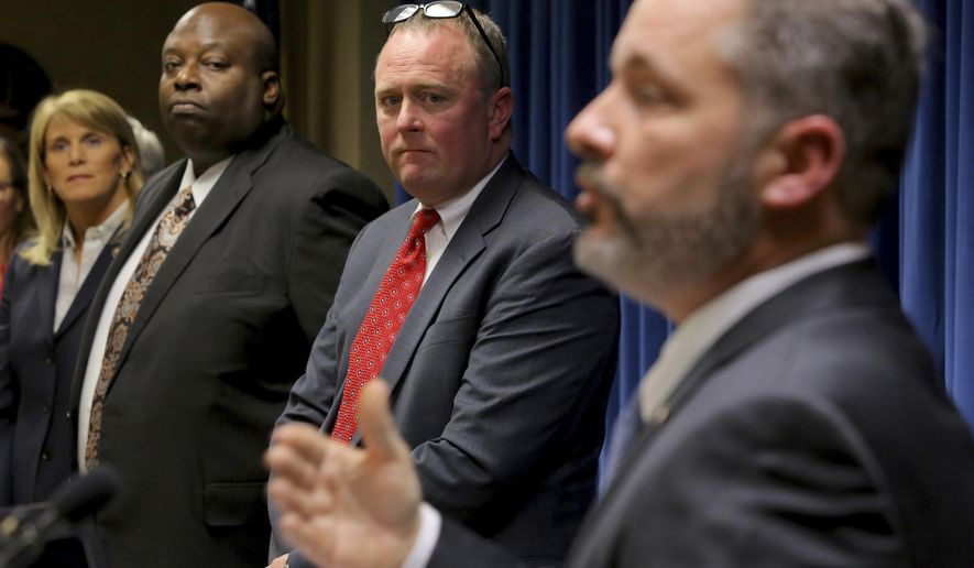 Little Rock FBI Special Agent in Charge Diane Upchurch, left, Little Rock Police Chief Kenton Buckner, second from left, and U.S. Attorney for the Eastern District of Arkansas Christopher Thyer listen as Jeffrey Reed, resident agent in charge of the ATF, right, speaks during a press conference in Little Rock, Ark. Tuesday Feb. 14, 2017 concerning progress made during the Violence Reduction Network initiative. (Stephen B. Thornton/The Northwest Arkansas Democrat-Gazette via AP)