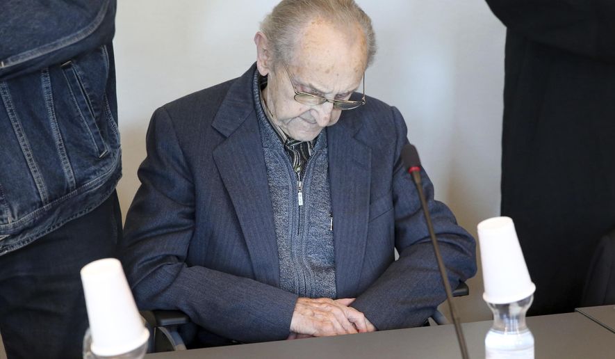 FILE - In this Sept. 12, 2016 file photo Hubert Zafke sits in a courtroom ahead of his trial in Neubrandenburg, eastern Germany. The former SS medic who served at the Auschwitz death camp is on trial in the northern German city of Neubrandenburg. (Bernd Wuestneck/dpa via AP)