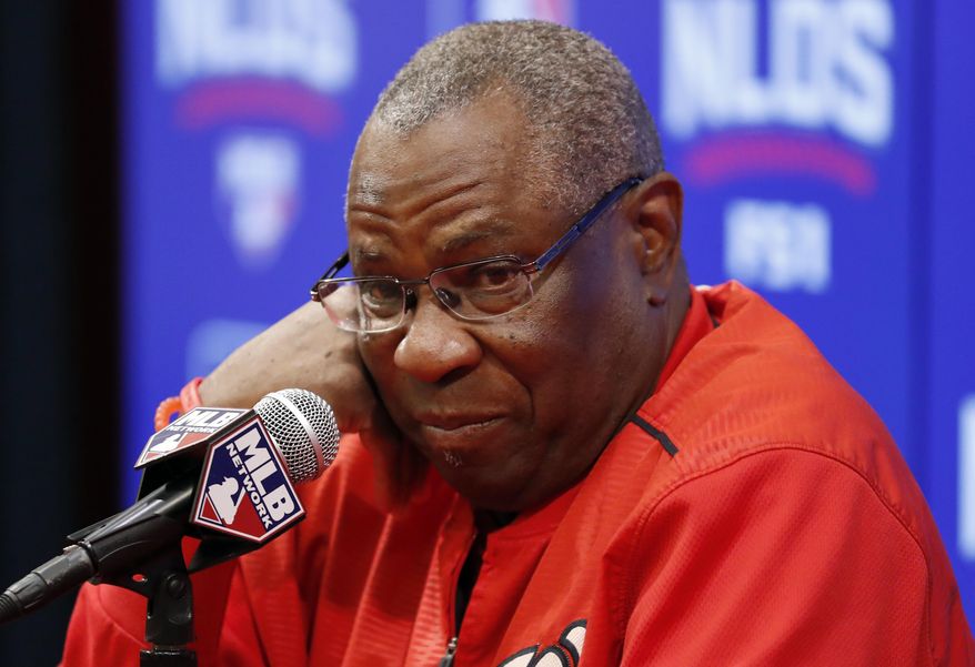FILE - In this Oct. 13, 2016 file photo, Washington Nationals manager Dusty Baker listens to a question during a media availability before Game 5 of baseball&#39;s National League Division Series against the Los Angeles Dodgers, at Nationals Park in Washington. Baker began preparations for his second spring training as the Nationals&#39; manager Tuesday, Feb. 14, 2017, when players began reporting to camp in West Palm Beach, Fla. (AP Photo/Alex Brandon, File)