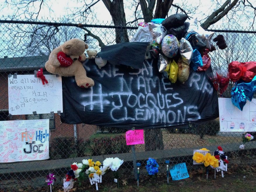 A memorial is seen set up in a neighborhood where near where Nashville Officer Josh Lippert on Friday shot Jocques Scott Clemmons in a Nashville, Tenn., Tuesday, Feb. 14, 2017. Clemmons died at the hospital Friday. Newly obtained surveillance video has caused Nashville police to revise their account of a traffic stop on Friday that ended with the white officer shooting and killing an armed African-American man. (AP Photo/Jonathan Mattise)
