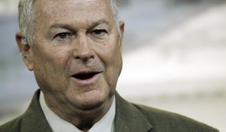 In this Nov. 13, 2013 file photo, Rep. Dana Rohrabacher, R-Calif., speaks during a news conference on Capitol Hill in Washington. Rohrabacher says a 71-year-old staffer was knocked unconscious Tuesday, Feb. 14, 2017, during an anti-Trump gathering at his Huntington Beach, Calif., office. (AP Photo/Lauren Victoria Burke, File)