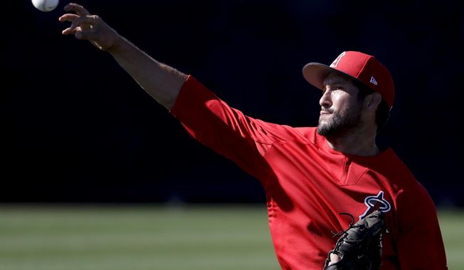 Los Angeles Angels relief pitcher Huston Street throws during spring baseball practice in Tempe, Ariz., Wednesday, Feb. 15, 2017. (AP Photo/Chris Carlson)